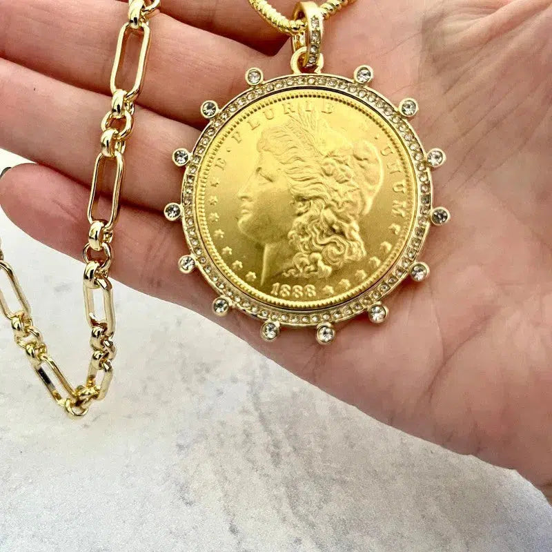 Lot - A sovereign gold coin, diamond and 18k gold pendant on a 14k gold  chain