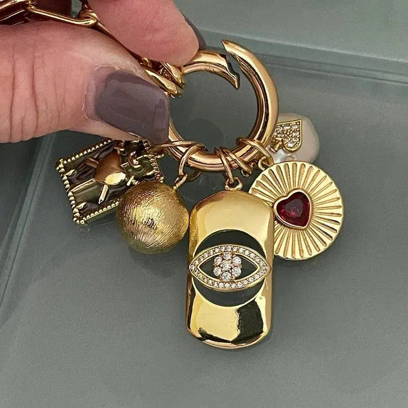 Gold Paperclip Charm Necklace-5 Charms-Fresh Water Pearl-Evil Eye Charm-Coat of Arms- Ball Charm-Ruby Heart Radial Charm-Spring Clasp