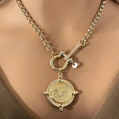 Gold French bee Pendant on a gold Rolo Chain with a CZ Shackle and connector