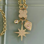 Gold Multi Charm Necklace-CZ Charms-Northern Star Charm-Coat of Arms Charm-Large CZ Stone -CZ Carabiner Clasp-X Kiss Charm Necklace