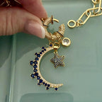 Gold Charm Necklace- CZ Mariner Clasp -Multiple Celestial Charms-Blue CZ Stones