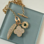 Gold Multi-Charm Necklace/Cubic Zirconia Toggle Charm Necklace