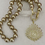 Hand Knotted Bronze Pearl Necklace – Gold Micro Pave Sunburst Pendant